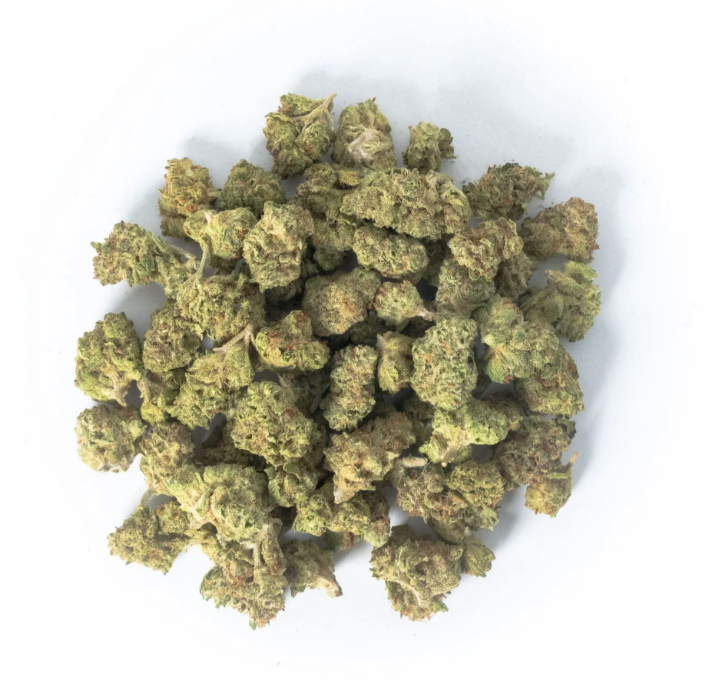 Indoor vs Greenhouse THCA flower shown in the photo of a pile of buds.